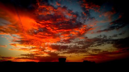 Scenic view of dramatic sky during sunset