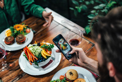 High angle view of man having food