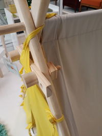 Close-up of clothes hanging in row