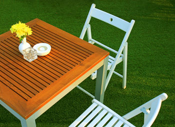 High angle view of empty bench on table