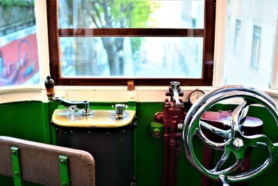 Close-up of faucet in bathroom