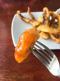 Close-up of meat in plate on table