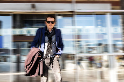 Full length of young man in sunglasses