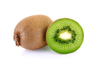 Close-up of fruits against white background