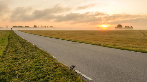 Scenic view of sunset over landscape