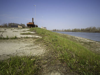 Scenic view of land against clear sky