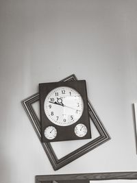 Close-up of clock against white background