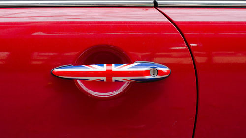 Close-up of british flag as car door handle