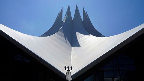 Low angle view of building against blue sky