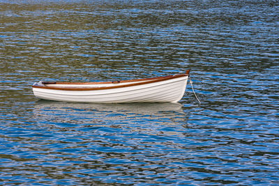 Boat moored in lake