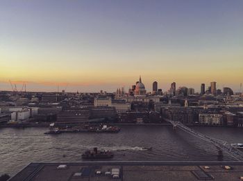 High angle shot of river against cityscape