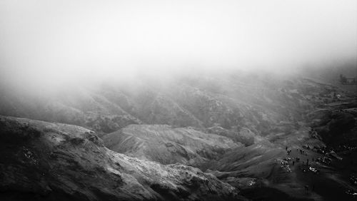 Scenic view of mountains during foggy weather