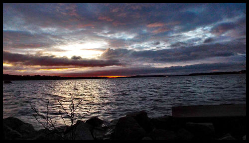 Scenic view of sea against cloudy sky