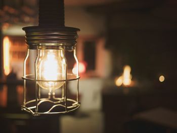 Close-up of illuminated light bulb