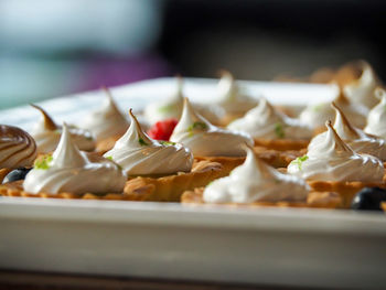 Meringue on mini pies at hotel restaurant.