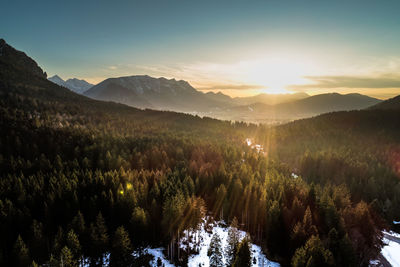 Scenic view of mountains against sky during sunset