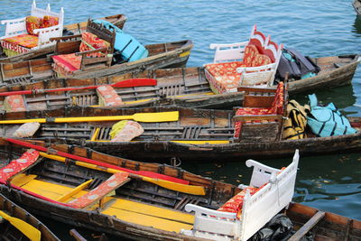 High angle view of abandoned boats moored at sea