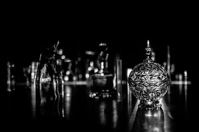 Reflection of illuminated lights in puddle