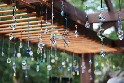 Low angle view of decorations hanging in store