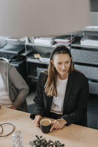 Smiling woman during business meeting