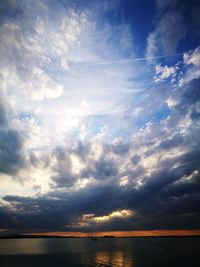 Scenic view of sea against sky at sunset