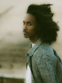 Portrait of young man looking away