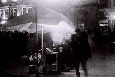 Woman with umbrella in rain