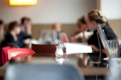 Sugar shaker standing on a table in a restaurant