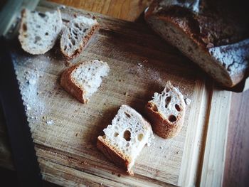 High angle view of bread on cutting board