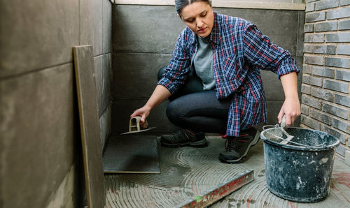 Woman working at construction site