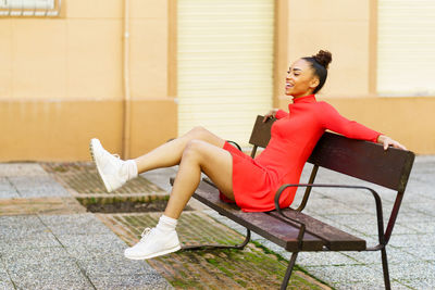 Young woman sitting on chair