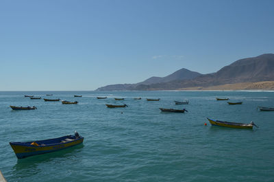 Scenic view of sea against clear sky