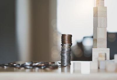 Close-up of coins on table