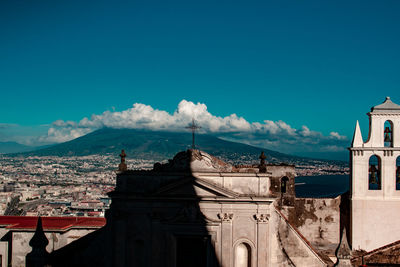Summer sunset panoramic city view of napoli, italy with vesuvius in the background