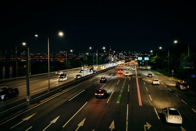 High angle view of vehicles on road at night