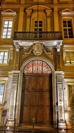 Low angle view of closed door of building