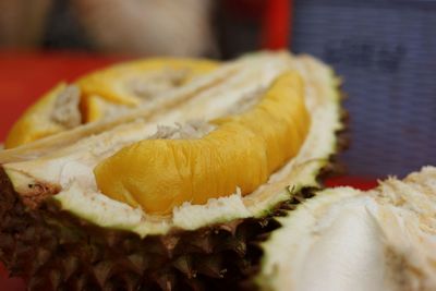 Close-up of orange slice in plate