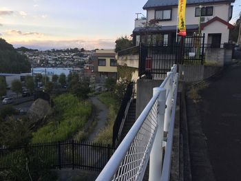 High angle view of buildings and trees against sky