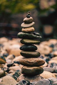 Close-up of stone stack on rock