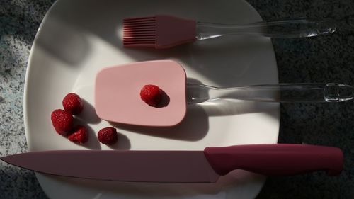 Close-up of raspberry in plate