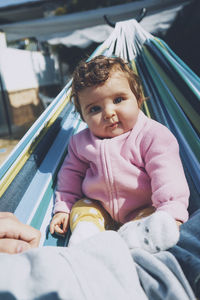 Portrait of smiling girl sitting in car