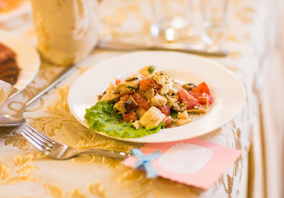 Close-up of food in plate on table