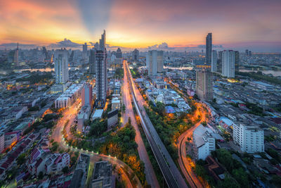 High angle view of city buildings during sunset