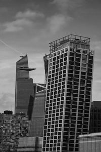 Low angle view of skyscrapers against sky