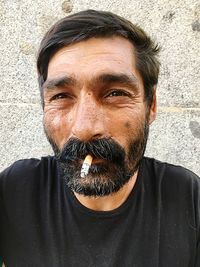 Close-up portrait of man smiling
