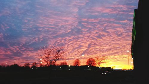 Scenic view of cloudy sky at sunset