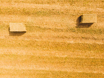 Aerial view of bales of straw. aerial view of field