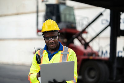 Portrait of man working on smart phone