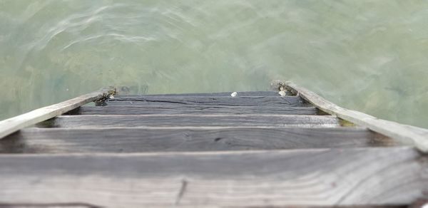 High angle view of driftwood on pier