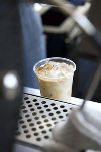 Close-up of iced coffee at coffee shop